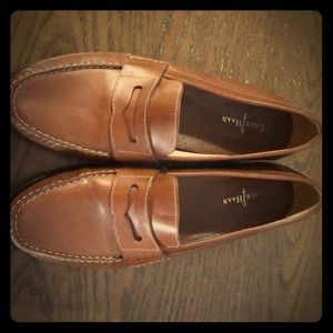 Brown leather dress loafer.
